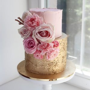 سفارش کیک تولد دو طبقه صورتی طلایی